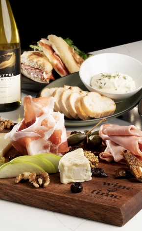 Charcuterie board with wine